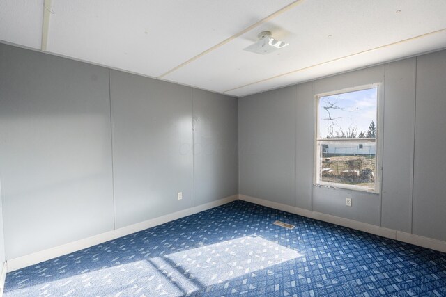 376 Benton Rd, Sycamore, OH 44882 - carpeted empty room featuring baseboards