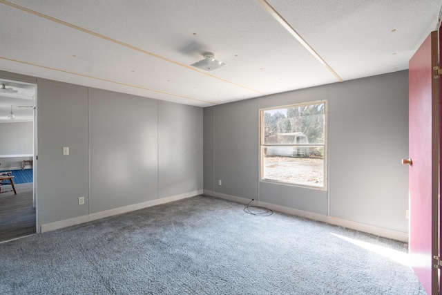 376 Benton Rd, Sycamore, OH 44882 - carpeted empty room featuring baseboards