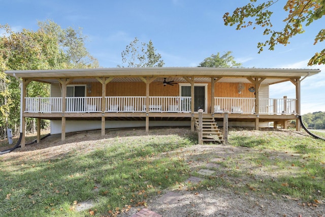 54780 Opossum Run Rd, Senecaville, OH 43780 - back of property featuring ceiling fan and stairs