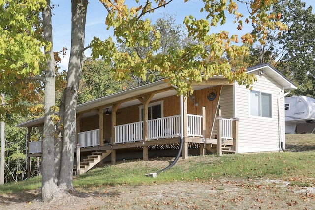 54780 Opossum Run Rd, Senecaville, OH 43780 - single story home featuring a porch and stairs