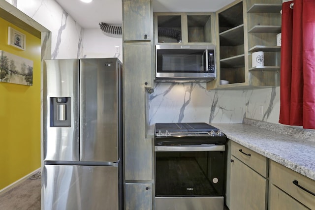 54780 Opossum Run Rd, Senecaville, OH 43780 - kitchen with appliances with stainless steel finishes, backsplash, carpet flooring, baseboards, and light stone countertops