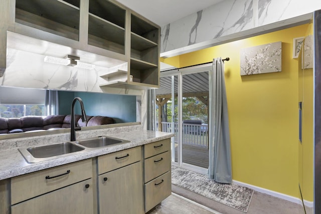 54780 Opossum Run Rd, Senecaville, OH 43780 - kitchen with a sink, light countertops, baseboards, and plenty of natural light