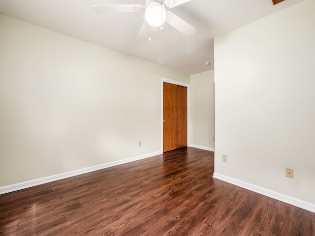3182 Grey Fox Dr, Columbus, OH 43230 - empty room featuring dark wood finished floors, baseboards, and a ceiling fan