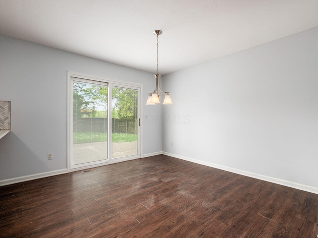 3182 Grey Fox Dr, Columbus, OH 43230 - empty room with dark wood finished floors and baseboards