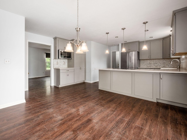3182 Grey Fox Dr, Columbus, OH 43230 - kitchen featuring gray cabinetry, stainless steel appliances, a sink, and tasteful backsplash