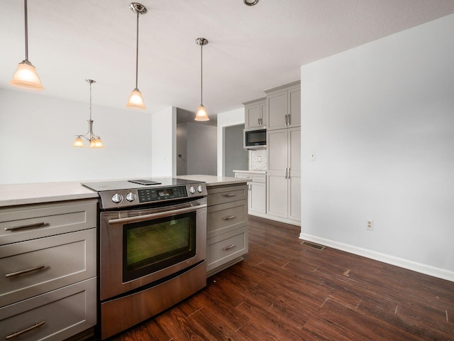 3182 Grey Fox Dr, Columbus, OH 43230 - kitchen with appliances with stainless steel finishes, gray cabinets, light countertops, and dark wood-style floors