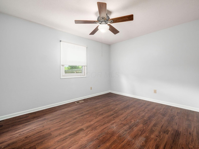 3182 Grey Fox Dr, Columbus, OH 43230 - empty room with baseboards, dark wood-style floors, and ceiling fan