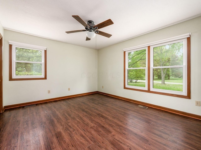 3182 Grey Fox Dr, Columbus, OH 43230 - empty room with dark wood-type flooring, baseboards, and a ceiling fan
