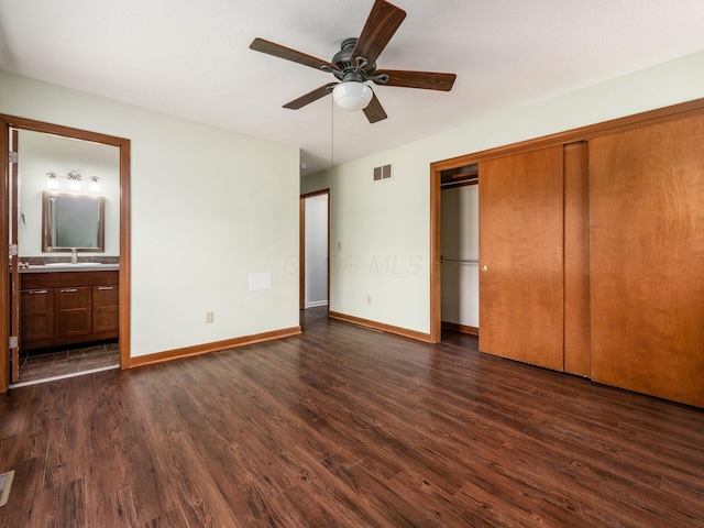 3182 Grey Fox Dr, Columbus, OH 43230 - unfurnished bedroom with dark wood-style floors, baseboards, a closet, and ensuite bathroom