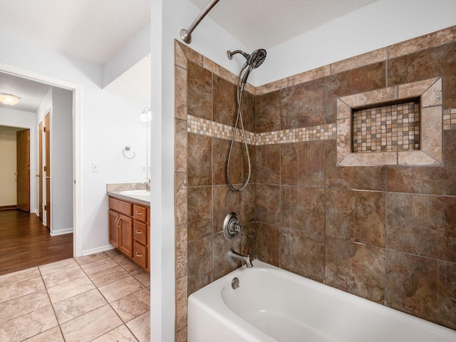 3182 Grey Fox Dr, Columbus, OH 43230 - bathroom with shower / washtub combination, vanity, tile patterned flooring, and baseboards