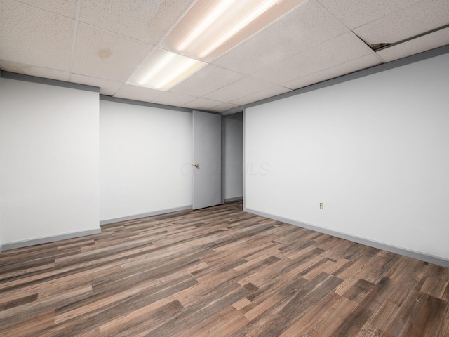 3182 Grey Fox Dr, Columbus, OH 43230 - finished below grade area with a paneled ceiling, wood finished floors, and baseboards