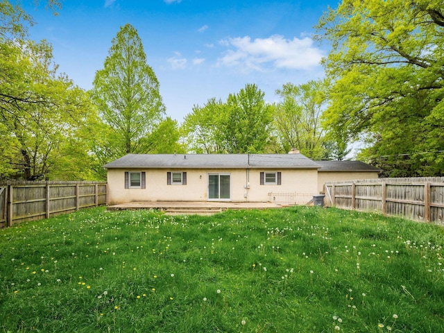 3182 Grey Fox Dr, Columbus, OH 43230 - rear view of property featuring stucco siding, a patio area, and a chimney