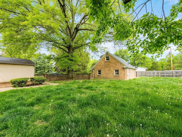 3182 Grey Fox Dr, Columbus, OH 43230 - fenced backyard with an outdoor structure
