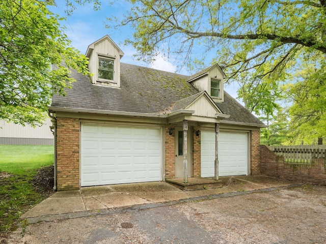 3182 Grey Fox Dr, Columbus, OH 43230 - view of front of property featuring brick siding, fence, a shingled roof, and driveway