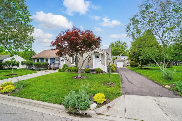 286 Rosslyn Ave, Columbus, OH 43214 - view of front of property featuring driveway, a front yard, and a garage