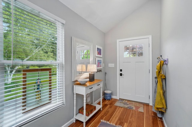 286 Rosslyn Ave, Columbus, OH 43214 - foyer entrance featuring wood finished floors, vaulted ceiling, and baseboards