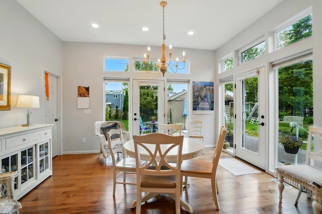 286 Rosslyn Ave, Columbus, OH 43214 - dining area with french doors, recessed lighting, a chandelier, light wood-type flooring, and baseboards