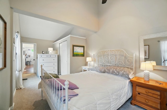 286 Rosslyn Ave, Columbus, OH 43214 - bedroom with carpet, a closet, and vaulted ceiling