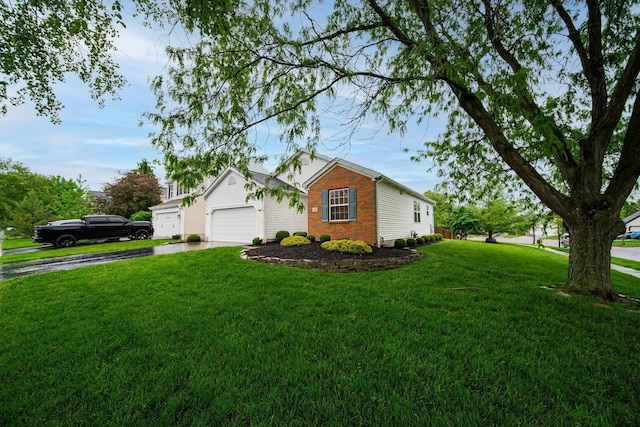 view of front of property featuring asphalt driveway, a front yard, brick siding, and a garage