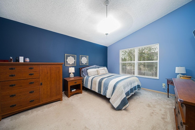 bedroom featuring vaulted ceiling, light colored carpet, a textured ceiling, and baseboards