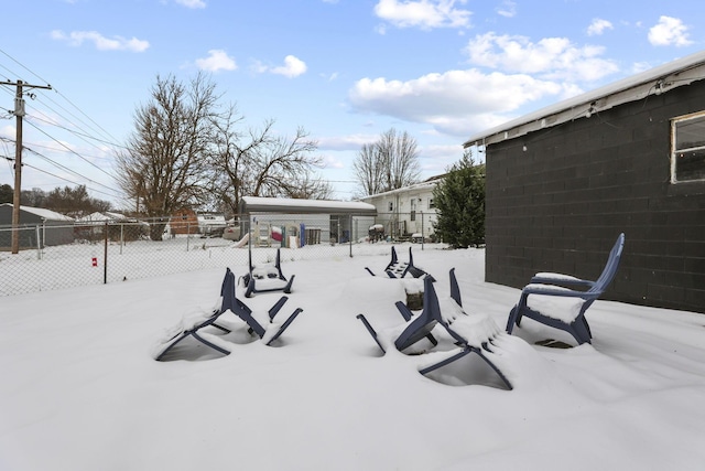 1096 Church St, Logan, OH 43138 - yard layered in snow featuring fence