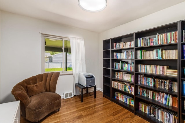 living area featuring wood finished floors