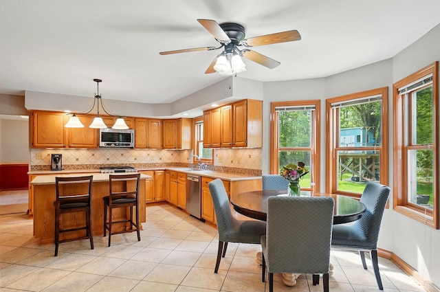 7227 Stemen Rd, Pickerington, OH 43147 - dining area with healthy amount of natural light, light tile patterned floors, and a ceiling fan