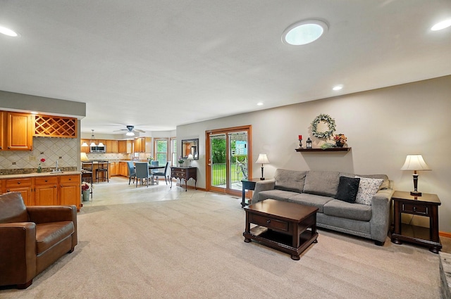 7227 Stemen Rd, Pickerington, OH 43147 - living area featuring light colored carpet, recessed lighting, baseboards, and a ceiling fan