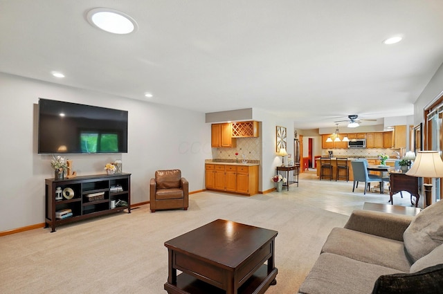 7227 Stemen Rd, Pickerington, OH 43147 - living area featuring baseboards, light carpet, recessed lighting, and a ceiling fan