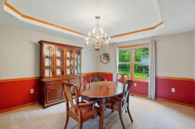 7227 Stemen Rd, Pickerington, OH 43147 - dining area with a tray ceiling, a chandelier, and light colored carpet