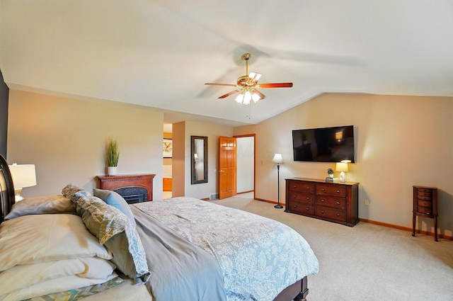 7227 Stemen Rd, Pickerington, OH 43147 - bedroom featuring light colored carpet, lofted ceiling, baseboards, ceiling fan, and a fireplace