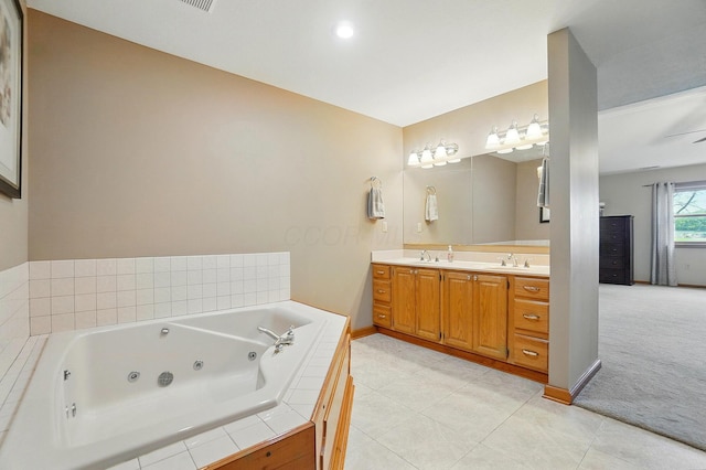 7227 Stemen Rd, Pickerington, OH 43147 - full bath with double vanity, tile patterned floors, a whirlpool tub, and baseboards