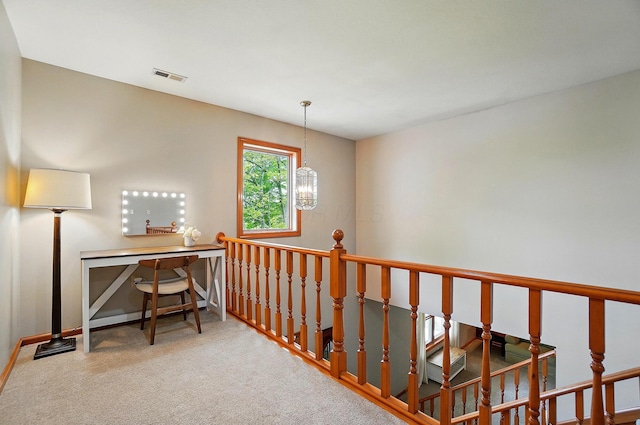 7227 Stemen Rd, Pickerington, OH 43147 - corridor featuring an upstairs landing, carpet flooring, a chandelier, and baseboards