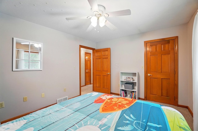 7227 Stemen Rd, Pickerington, OH 43147 - bedroom featuring baseboards, carpet floors, and a ceiling fan
