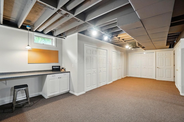 7227 Stemen Rd, Pickerington, OH 43147 - below grade area with dark colored carpet and baseboards