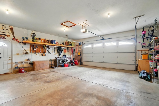 7227 Stemen Rd, Pickerington, OH 43147 - garage with a garage door opener and a workshop area