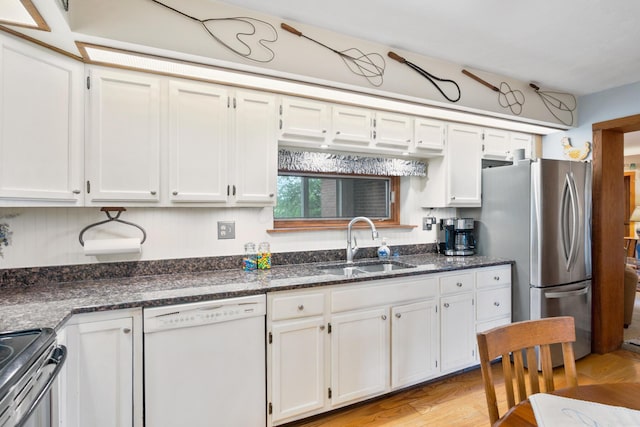 13535 Vans Valley Rd, Galena, OH 43021 - kitchen featuring dishwasher, a sink, freestanding refrigerator, white cabinets, and light wood-style floors