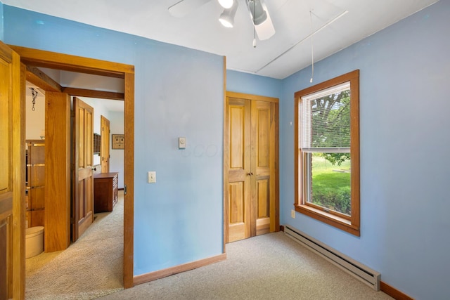 13535 Vans Valley Rd, Galena, OH 43021 - unfurnished bedroom featuring baseboard heating, light colored carpet, baseboards, and a closet