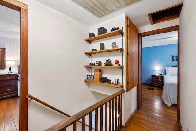 13535 Vans Valley Rd, Galena, OH 43021 - hall with hardwood / wood-style floors, an upstairs landing, and baseboards