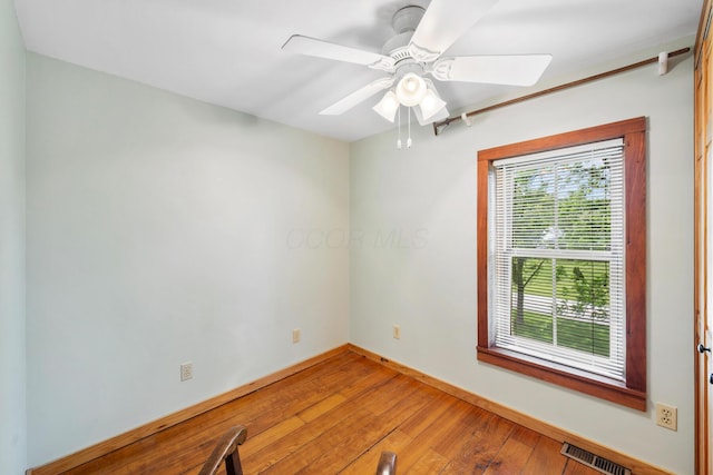 13535 Vans Valley Rd, Galena, OH 43021 - unfurnished room with wood-type flooring, baseboards, and ceiling fan