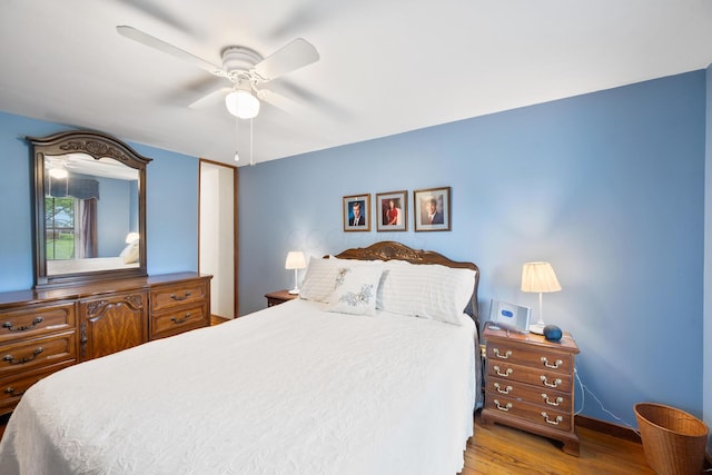 13535 Vans Valley Rd, Galena, OH 43021 - bedroom with wood finished floors, baseboards, and a ceiling fan