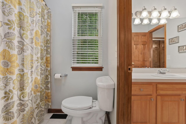 7235 Ballou Rd, Heath, OH 43056 - full bathroom featuring vanity, toilet, tile patterned flooring, and a shower with curtain