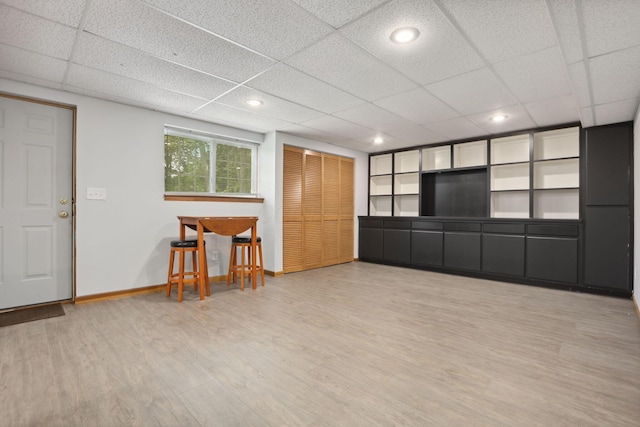 7235 Ballou Rd, Heath, OH 43056 - living area with a drop ceiling, light wood-style flooring, baseboards, and recessed lighting