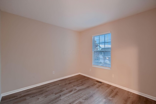 3983 Summerstone Dr, Columbus, OH 43230 - unfurnished room with wood finished floors and baseboards