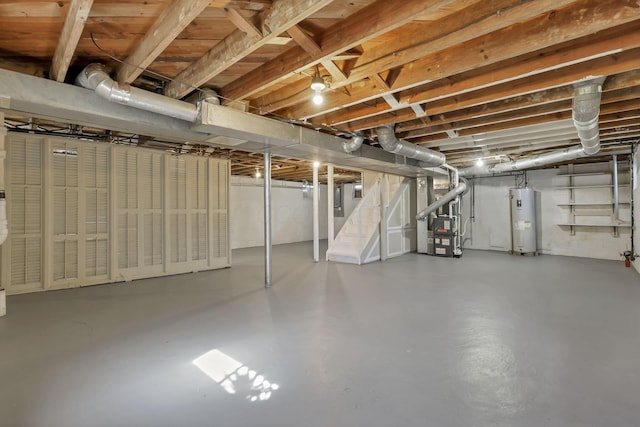 206 Goose Pond Rd, Newark, OH 43055 - unfinished below grade area featuring water heater, stairs, and heating unit