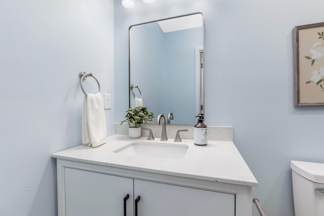 225 Reeb Ave, Columbus, OH 43207 - half bath featuring vanity and toilet