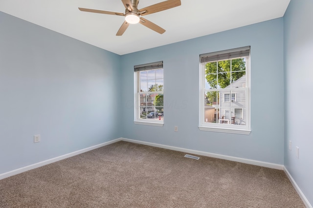 225 Reeb Ave, Columbus, OH 43207 - unfurnished room featuring carpet flooring and a ceiling fan