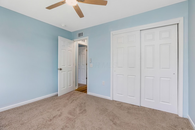 225 Reeb Ave, Columbus, OH 43207 - unfurnished bedroom with carpet, a closet, and ceiling fan