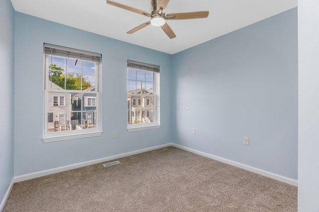 225 Reeb Ave, Columbus, OH 43207 - unfurnished room with carpet and a ceiling fan