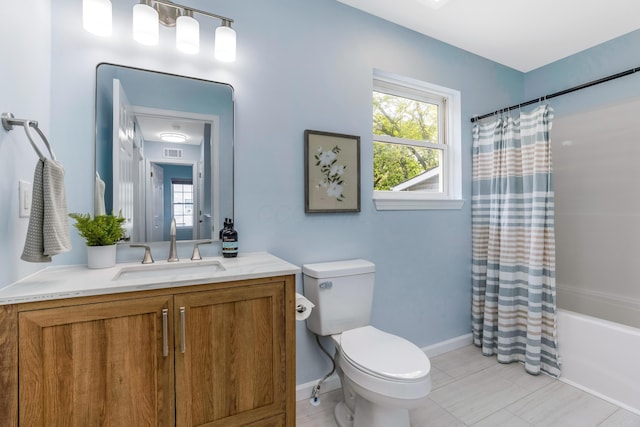 225 Reeb Ave, Columbus, OH 43207 - bathroom featuring vanity, shower / bathtub combination with curtain, and tile patterned floors